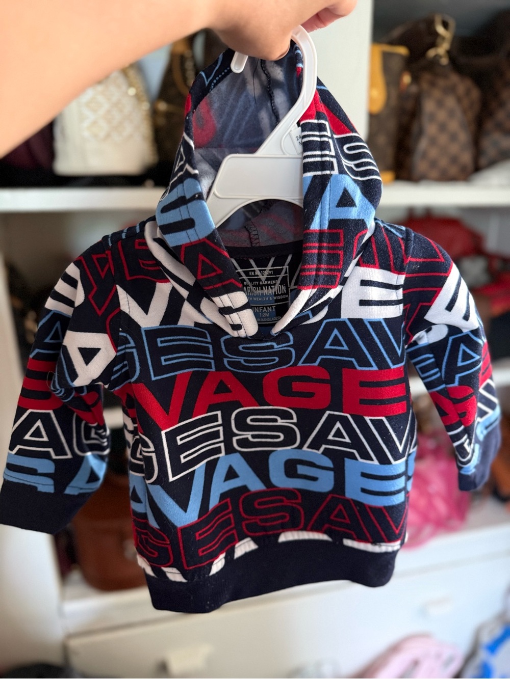 Parish Nation Savage Hoodie with repeating 'SAVAGE' text in red, white, and blue